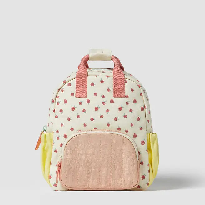 Children's backpack with strawberry pattern on a light gray background